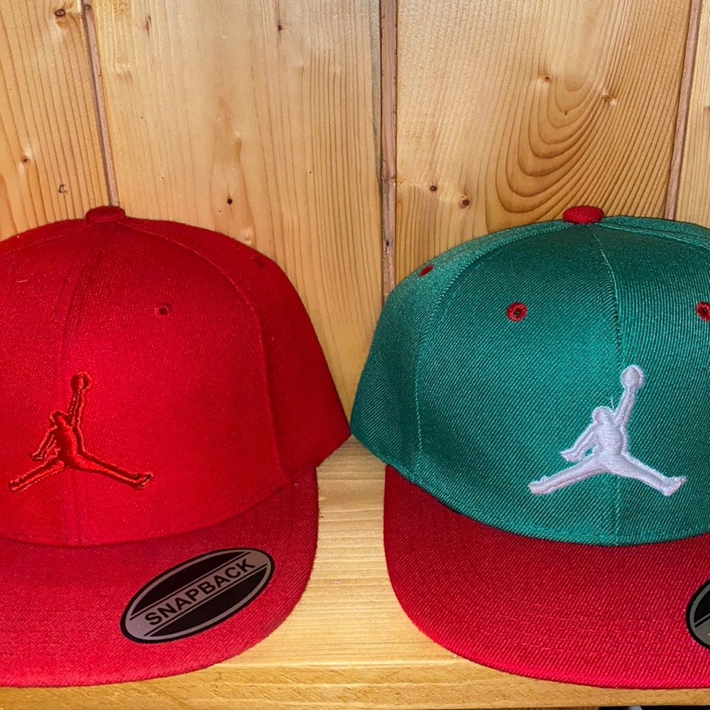Two JORDAN SNAPBACK flat bill hats